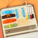 Tablica manipulacyjna sensoryczna montessori walizka dinozaury Kik Sp. z o. o. Sp. k.